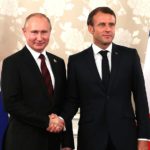 Владимир Путин и Эммануэль макрон ан саммите G-20 в Японии